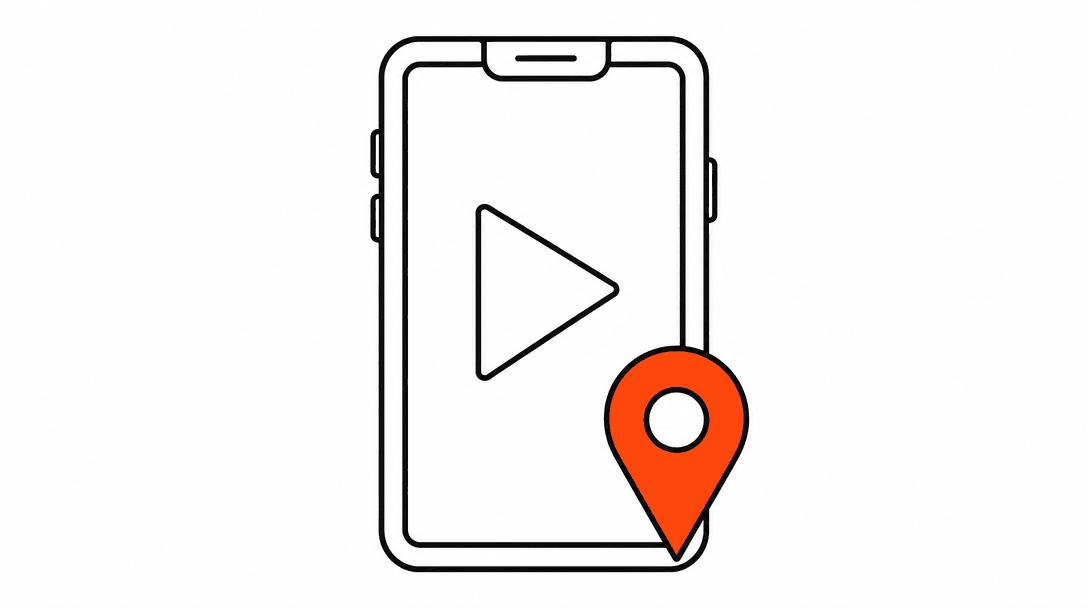 A phone screen outline displaying a play-button triangle, with a location-pin icon in orange overlaid at the bottom corner, on white background.